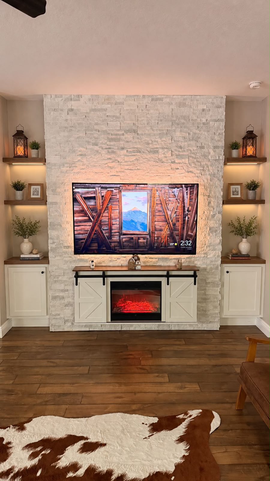 White TV wall with LED lighting